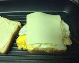 A picture of step 11 of Grilled Sausage Fried Egg And Cheese.