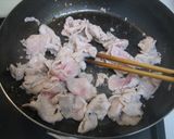 A picture of step 3 of Stir Fried Cabbage and Pork with Tomato Sauce.