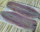 A picture of step 1 of Fried Seasonal Pacific Saury with Shiso and Plum.