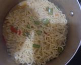A picture of step 6 of Indomie noodles and potatoes chips.
