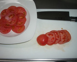 A picture of step 1 of Simple Tomato and Onion Salad.