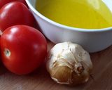 A picture of step 1 of Sig's Pan Cooked Smoked Garlic and Tomatoes.