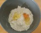 A picture of step 1 of Using a Bread Maker Orange Peel and Chocolate Chip Bread.