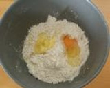 A picture of step 1 of Using a Bread Maker Orange Peel and Chocolate Chip Bread.