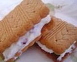A picture of step 9 of Rum Raisin Ice Cream Cookie Sandwiches.