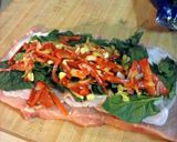 A picture of step 2 of spinach and pepper stuffed pork loin with parmesan potato wedges and mixed veggies.