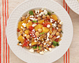 A picture of step 4 of Acorn Squash and Chickpea Stew over Couscous with Feta and Mint.