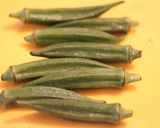A picture of step 1 of Pork-Wrapped Okra.