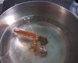 A picture of step 1 of Cinnamon butterfly pea tea.