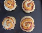 A picture of step 12 of Ham And Cheese Pinwheels.