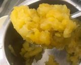 A picture of step 2 of Aam panna with jaggery.