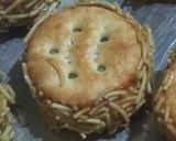 A picture of step 5 of Cheezy Biscuit Sandwich Bites.