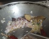 A picture of step 3 of Black vatana pulao.