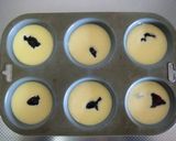 A picture of step 6 of Berry Jam Mini Cheesecakes.