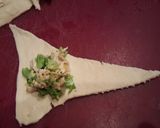 A picture of step 3 of Cheesy Stuffed Crossiant.