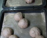 A picture of step 7 of Chewy Little Walnut-Raisin Whole Wheat Rolls.