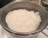 A picture of step 1 of Manila Clam Seasoned Rice.