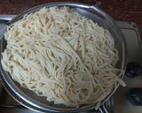 A picture of step 1 of Singapore chicken noodles rice.