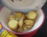 A picture of step 1 of Butter Roasted Potatoes.