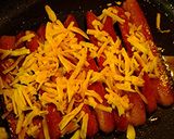 A picture of step 5 of Pan fried hotdog sandwich.