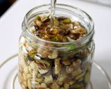 A picture of step 3 of Honey Marinated Roasted Nuts.