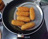 A picture of step 6 of Chicken Tandoori Roll.