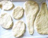 A picture of step 6 of Light and Puffy Homemade Naan Bread in a Pan.