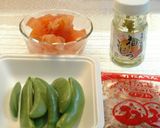 A picture of step 1 of Snap Peas and Tomatoes with Yuzu Pepper.