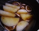 A picture of step 5 of Boiled Daikon with Squid.