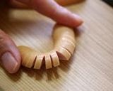A picture of step 4 of Lion Shaped Wiener Sausage (Decorative Bento Item).