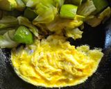 A picture of step 6 of Fried Eggs with Avocado and Cabbage.
