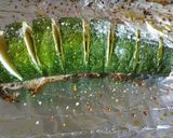 A picture of step 2 of Parmesan stuffed baked Zucchini.