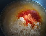 A picture of step 2 of Rice with Smoked Pork Loin, Egg, and Corn.
