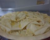 A picture of step 5 of Left over turkey and gammon and leek fila pie.