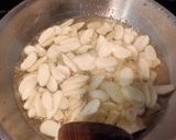 Foto langkah ke 3 dari resep Bawang Putih Goreng.