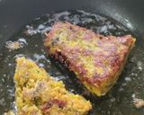 A picture of step 7 of Crispy lauki triangles.