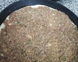 A picture of step 2 of Large-Size Lahm Bi Ajeen (Meat Pies) 😉.
