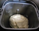 A picture of step 1 of Plump and Soft Butter Rolls (Using a Bread Maker).