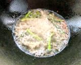 A picture of step 3 of Dahi Aloo.