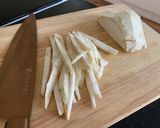 A picture of step 1 of Asian style celeriac matchstick chips.