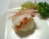 A picture of step 12 of Simple Temari Sushi Using a Pack of Sashimi.