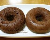 A picture of step 6 of Baked Dark Chocolate Donuts Made with Pancake Mix.