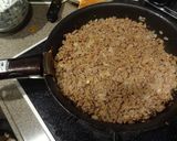 A picture of step 1 of Easy Mexican Seven Layer Dip.