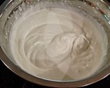 A picture of step 7 of Vanilla Chip Layer Cake with Cherry Curd Filling.