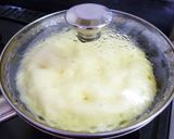 A picture of step 9 of Sweet Potato Cake using a Frying Pan and Pancake Mix.