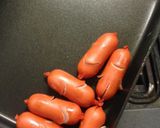 A picture of step 2 of Sausage Aliens.