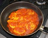 A picture of step 11 of Italian Sautéed Chicken Breasts in Tomato Sauce.