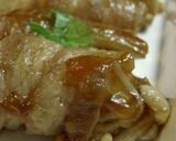 A picture of step 5 of Japanese-style Enoki Mushrooms and Hanpen Fish Cake Wrapped with Sliced Pork.