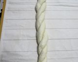 A picture of step 8 of Fluffy Powdered Snow Christmas Bread Wreath.