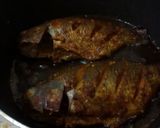 A picture of step 2 of Indian style fried fish.